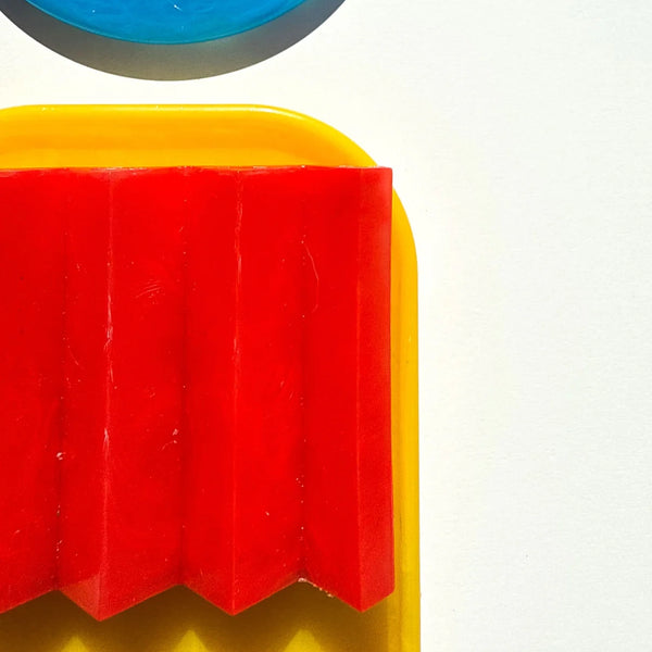 Bauhaus ZigZag soap dish red recycled plastic on yellow 