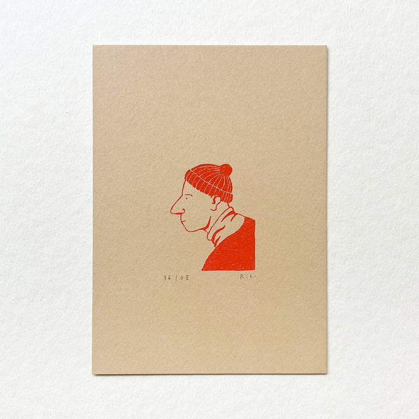 A square art print on textured beige paper featuring a minimalist red ink illustration of a man in profile wearing a knit beanie, displayed against a clean white background.