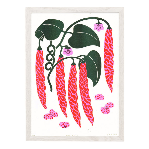 White wood framed artwork of red and pink berlotti beans and green leaves on a white background