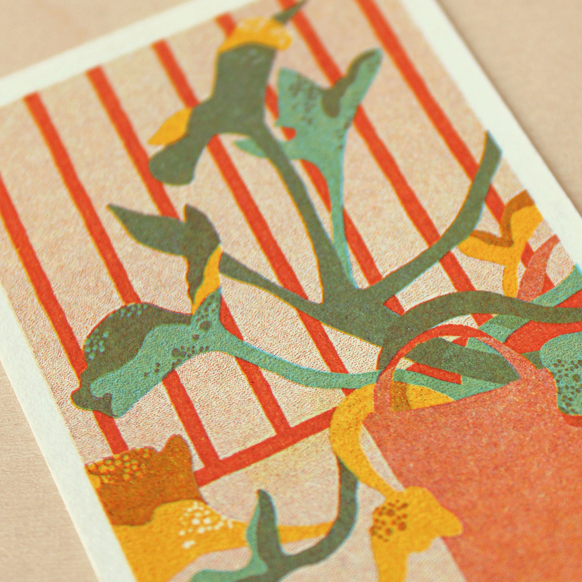 Decorative illustration with green leaves and red stripes on a beige background