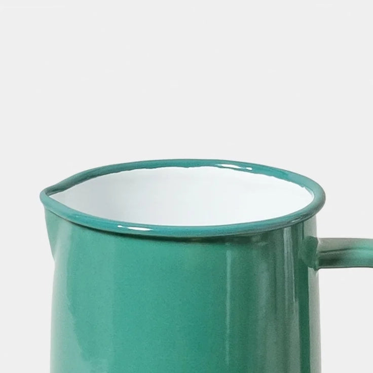 Spring Green Teal enamel jug falconware on a white background