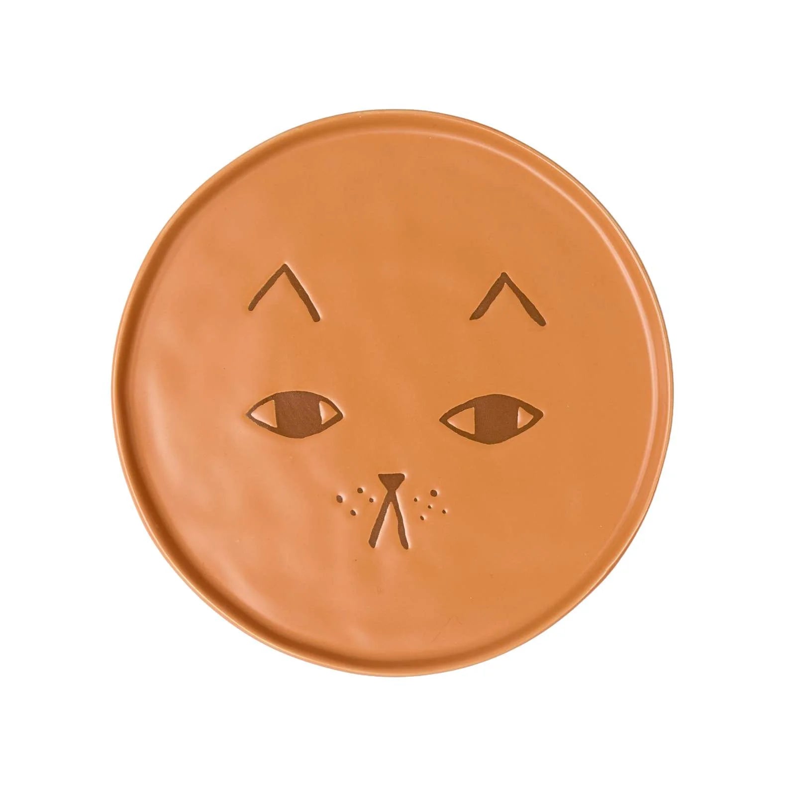 A round terracotta-colored ceramic plate featuring a carved cat face design, shown against a plain white background.