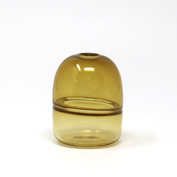 Amber hand blown glass bud vase emma baker on white background