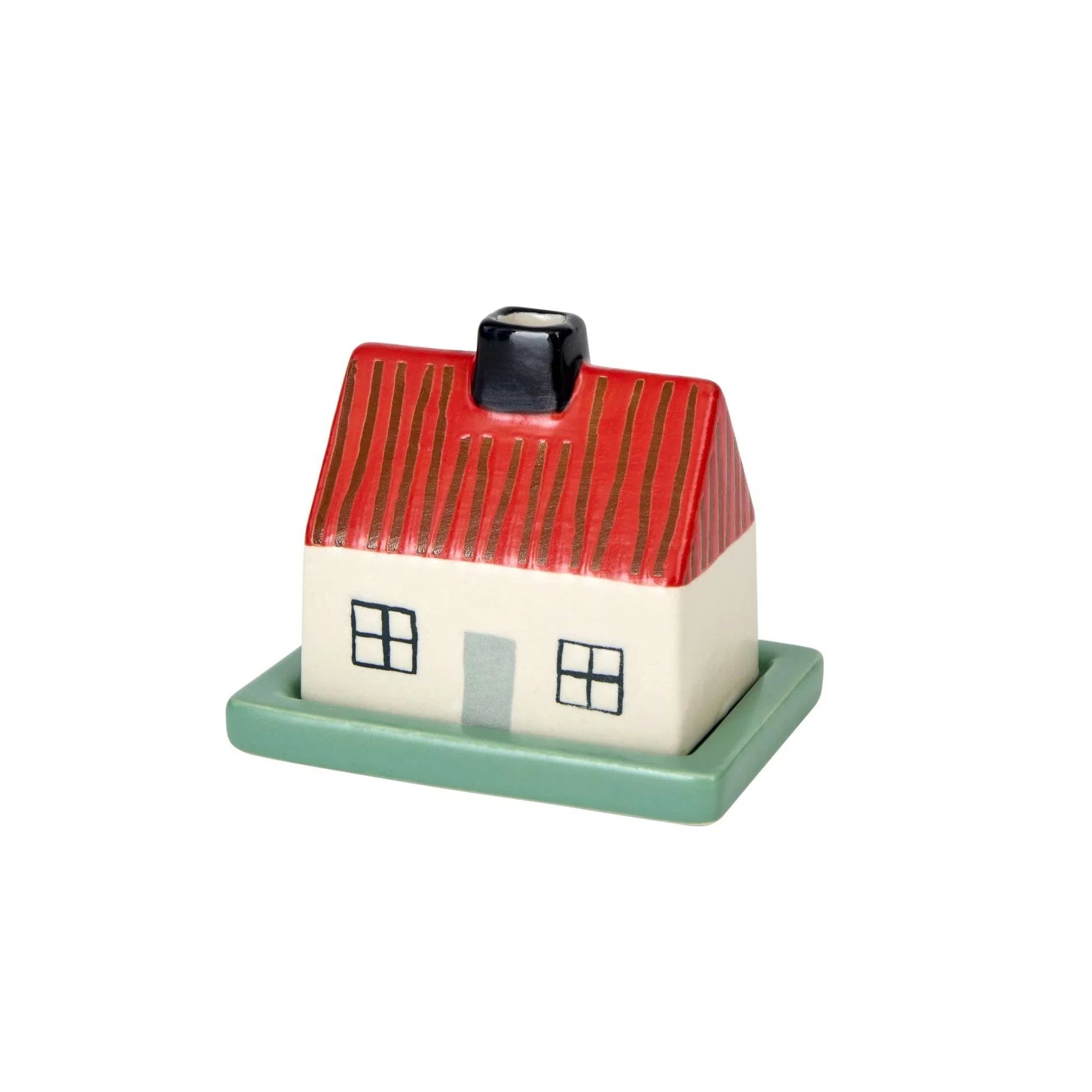 A small decorative house-shaped container or figurine with a red striped roof, cream-colored body, black window and chimney details, and a mint green base, shown on a plain white background.