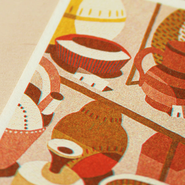 Patterned fabric with abstract designs of pots and bowls on a beige background