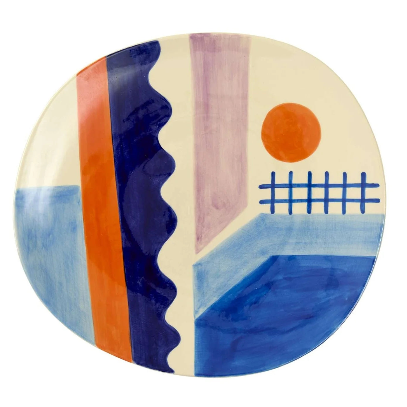 A round ceramic plate featuring a colorful abstract geometric pattern with blue, navy, orange, pink, and cream sections.