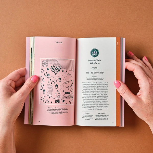 Open book with a map and text on a brown background