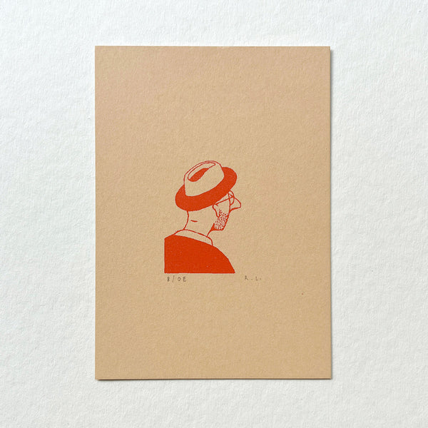 A minimalist art print featuring a red line-art illustration of a man in profile wearing a trilby hat, printed on a square beige card against a textured white background.
